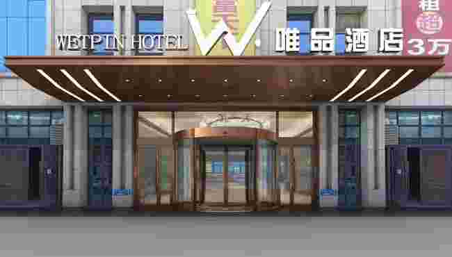 安康高新唯品酒店旋轉(zhuǎn)門、發(fā)光字、雨棚安裝
